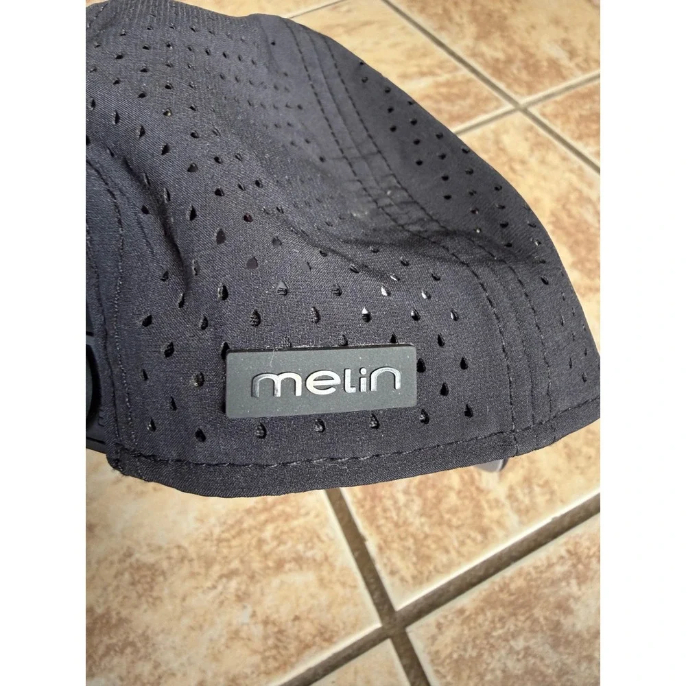 Melin A-Game Hydro Black Performance Snapback Hat 60cm L/XL Water Resistant